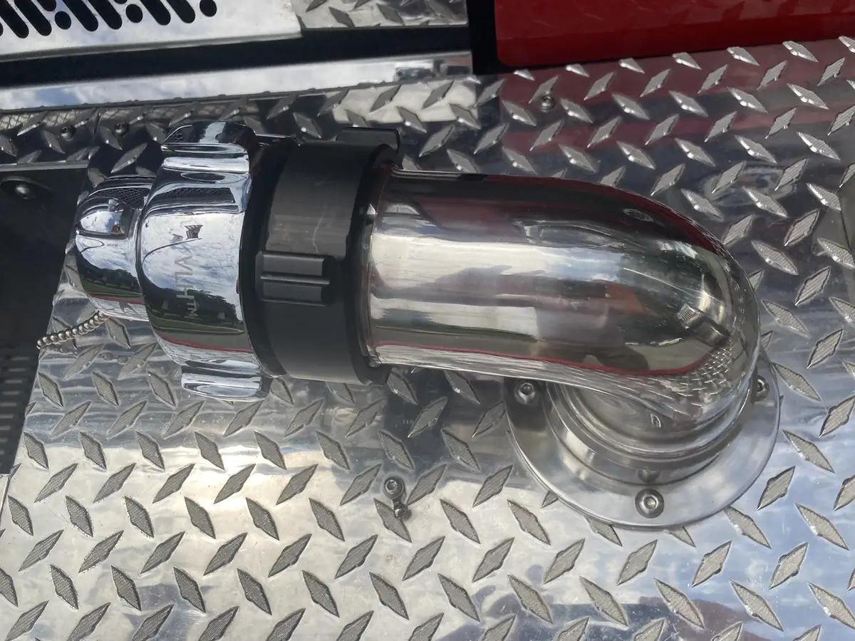 Door crest logo close-up with company number and crossed tools