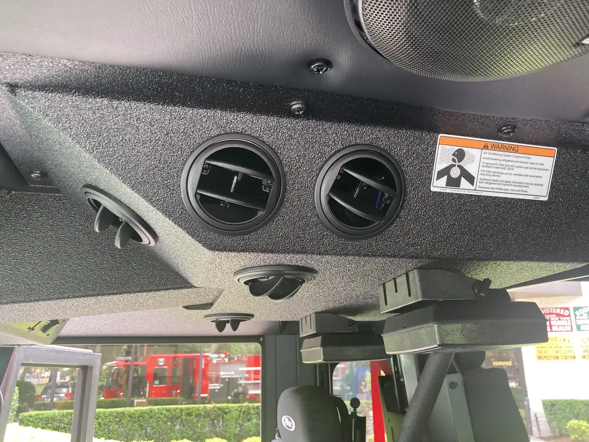 Pump status display close-up showing battery voltage and air tank pressure