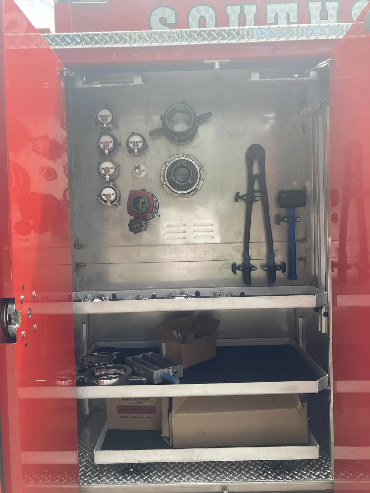 Open toolboard compartment alternate angle with fittings and shelf storage