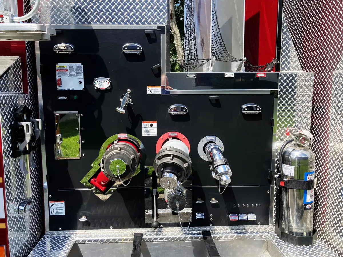 Pump panel close-up showing gauges, levers, and intake controls