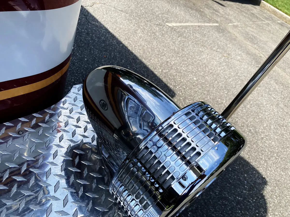 Rear-left exterior view showing hosebed, chevrons, and body corner lighting