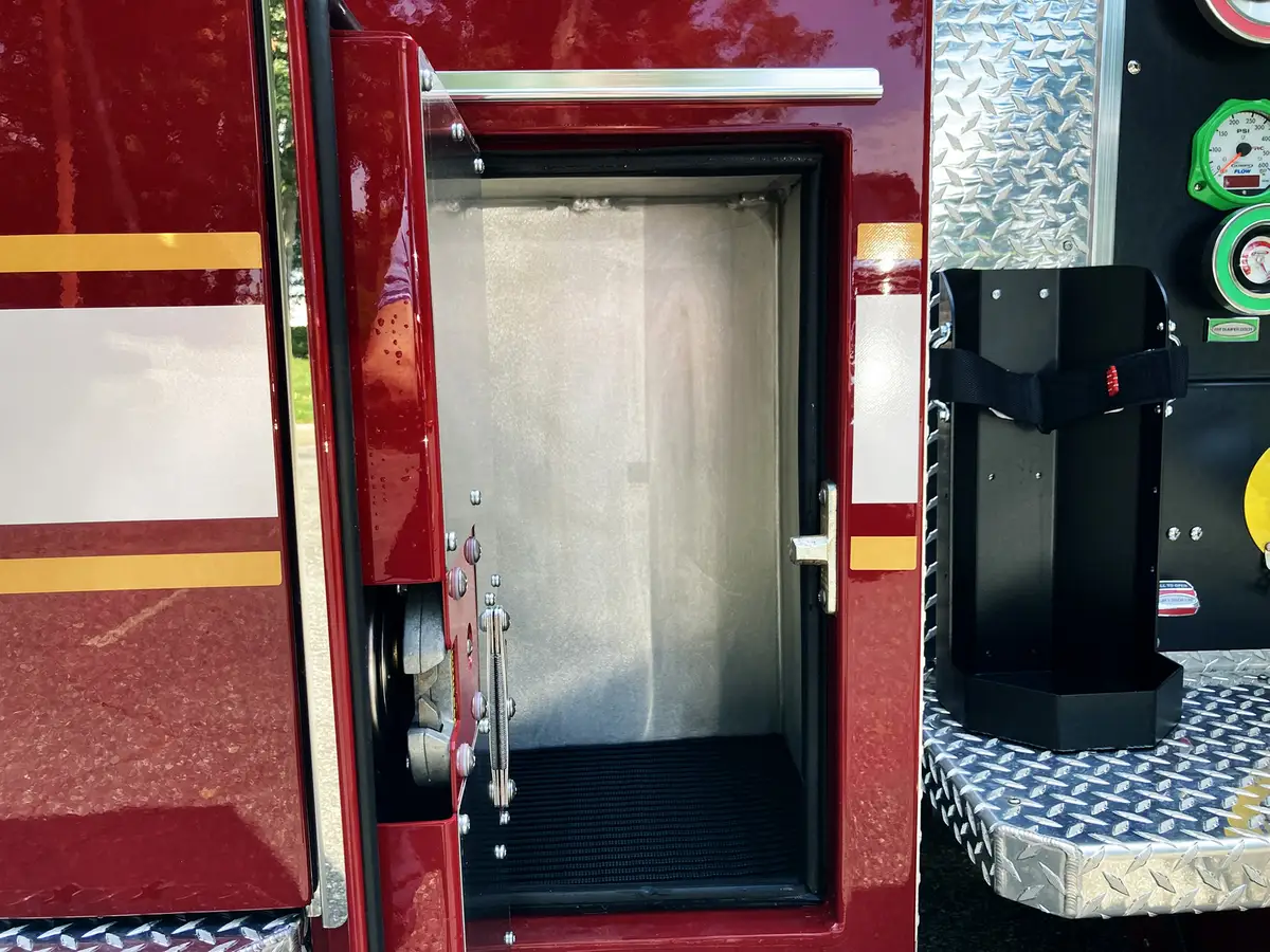 Rear crew area view showing SCBA seat backs and aisle space