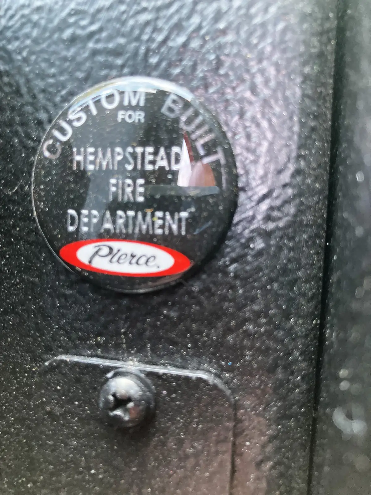 Rear crew compartment close-up showing SCBA mounts and seat restraints