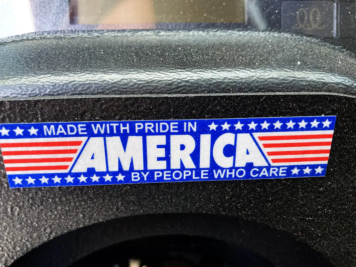 Dashboard control panel close-up showing rocker switches and indicator lights