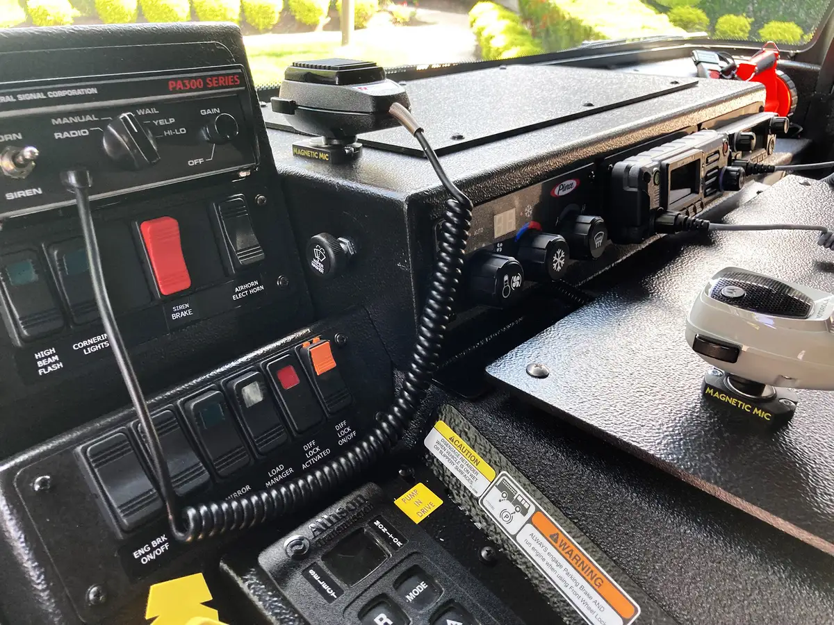 Instrument cluster close-up showing speedometer, tachometer, and warning indicators
