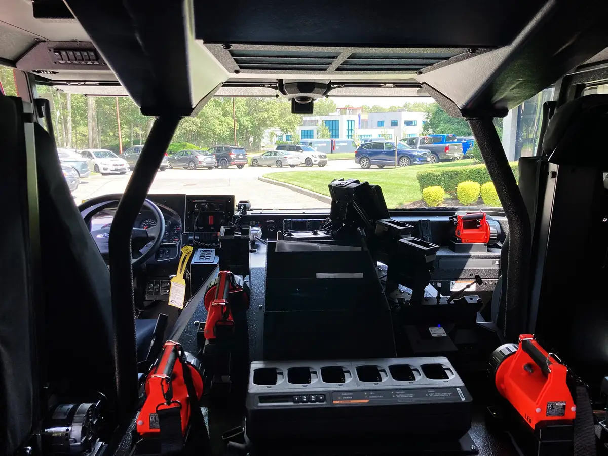 Cab door logo close-up showing crest graphic and reflective striping