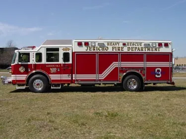 Driver-side full profile showing rescue body and rear wheelbase