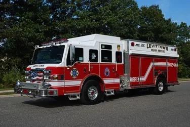 Front-left exterior profile showing crew cab, side body, and wheel area