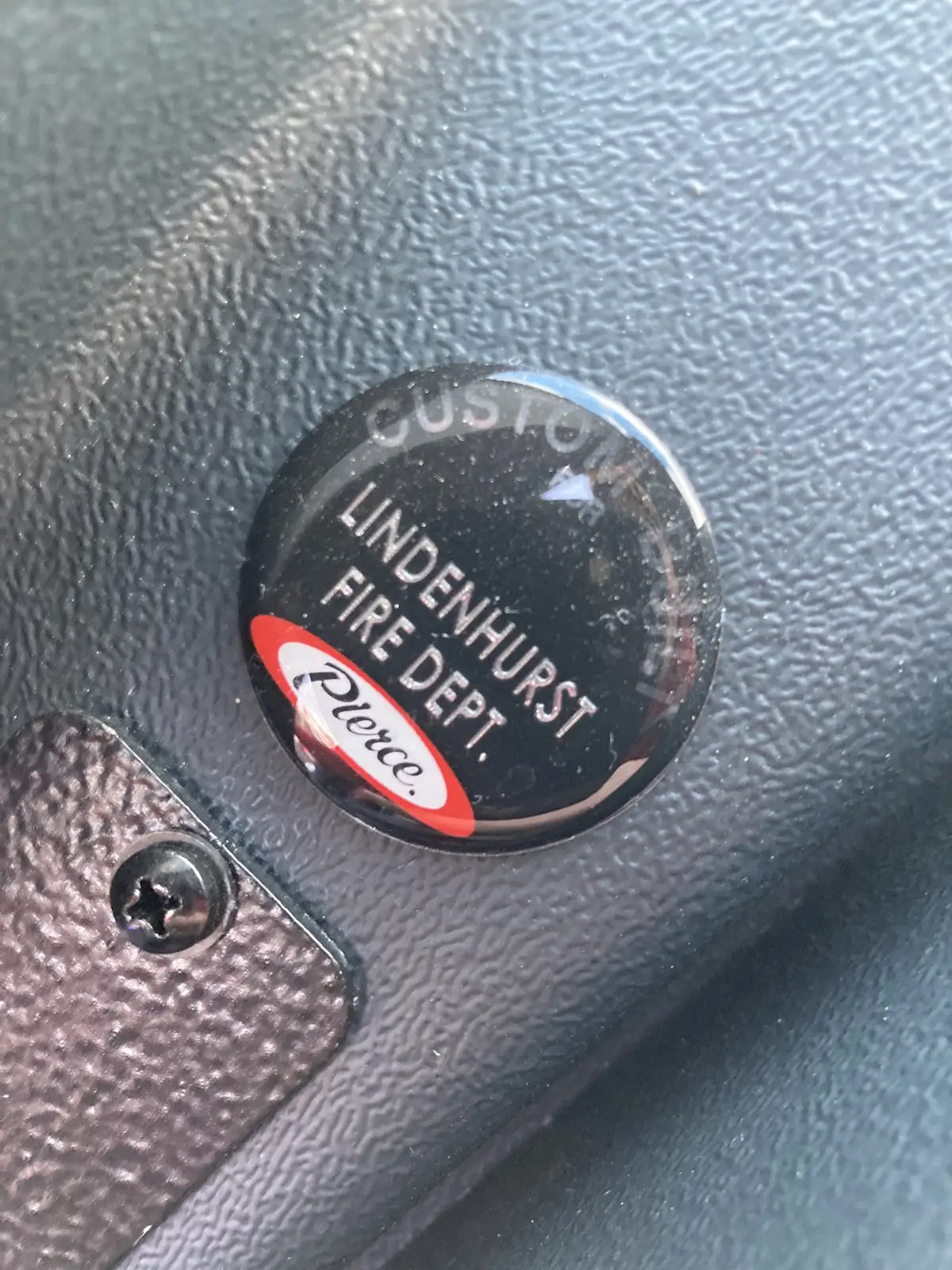 Driver-side profile view showing pump panel area and mid-body compartments