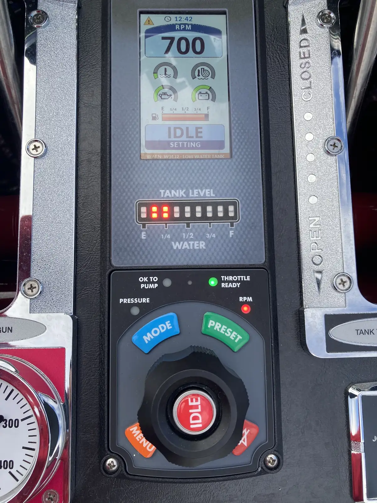 Rear-side compartment open showing bag storage and lower tray space