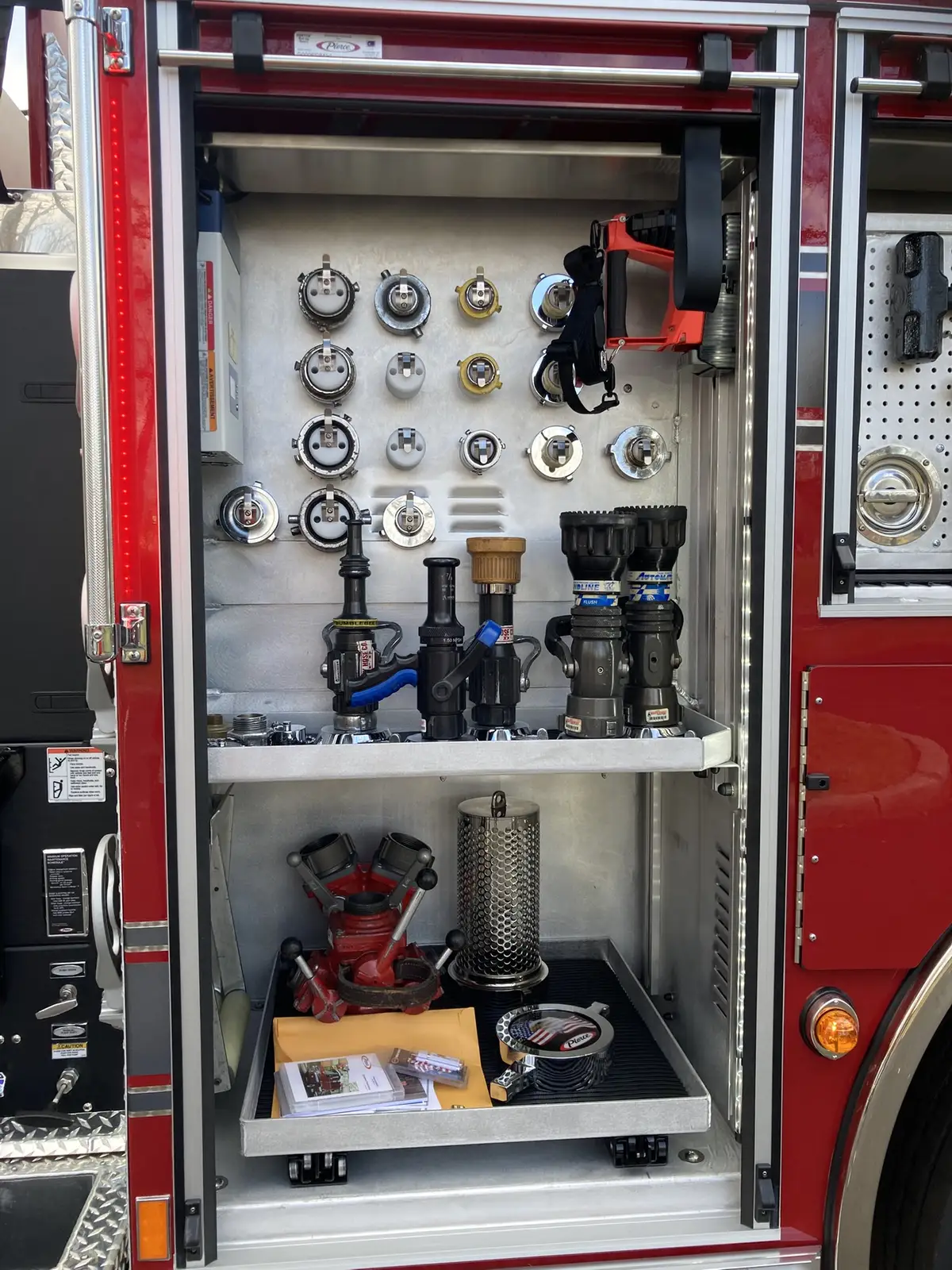 Side body view showing mounted ladders and upper body rails