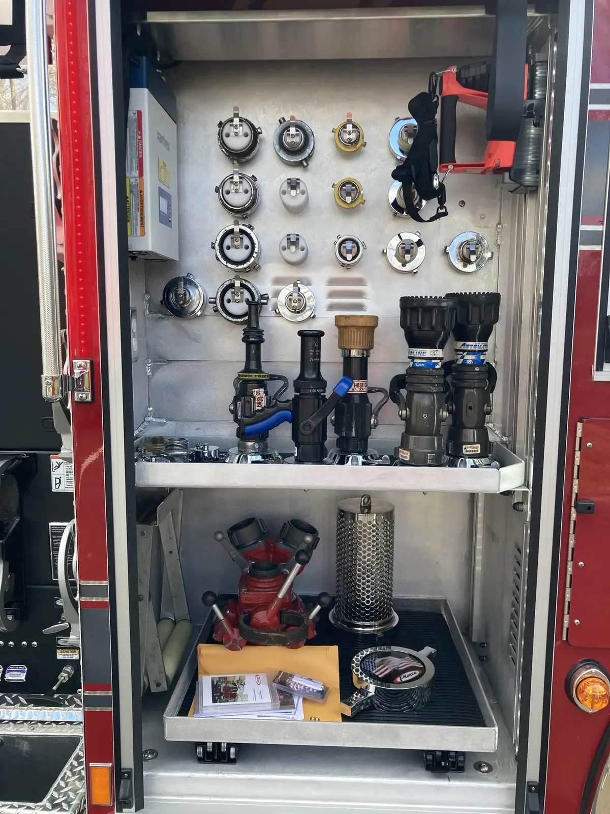 Cab interior wide view showing front seats, dashboard, and center console