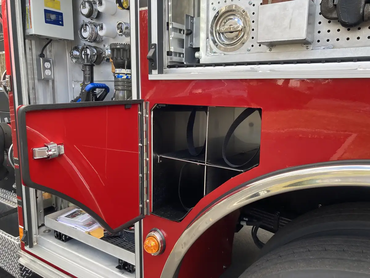 Rear crew area interior view showing SCBA seats and center aisle