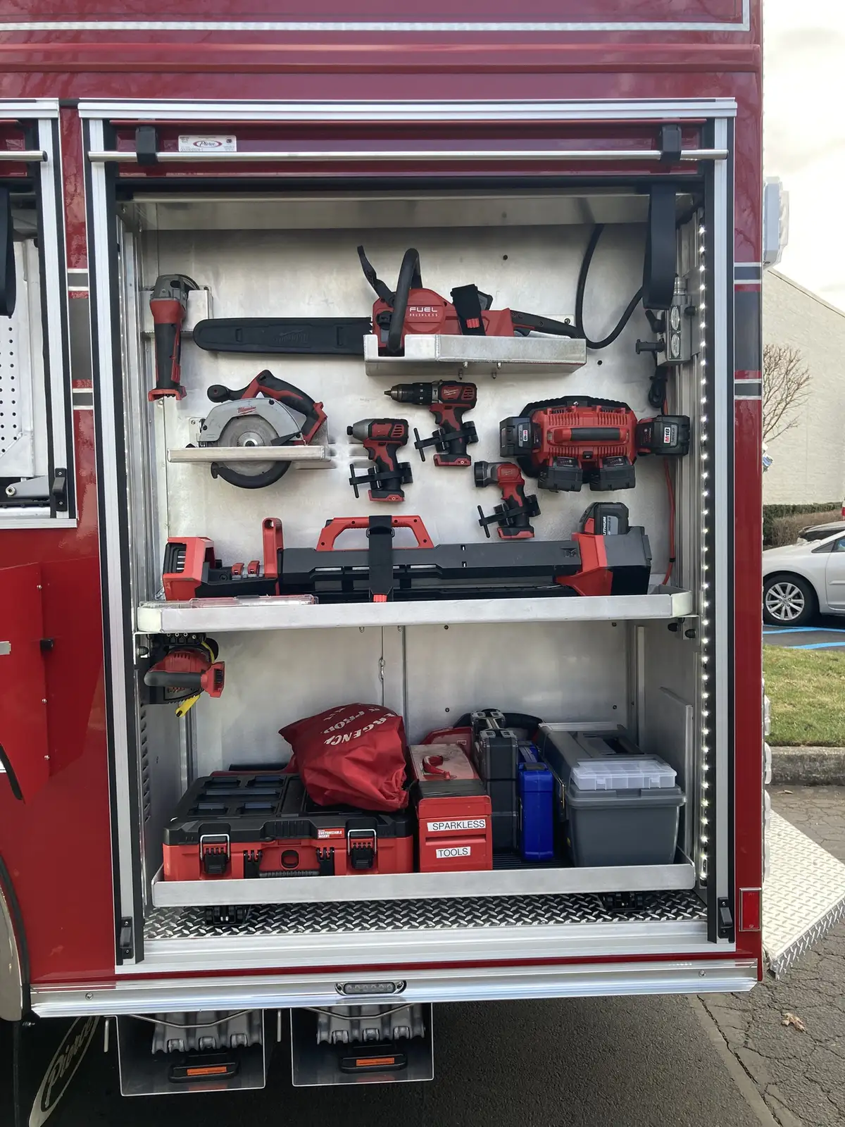 Rear crew seat close-up showing SCBA brackets and shoulder restraints