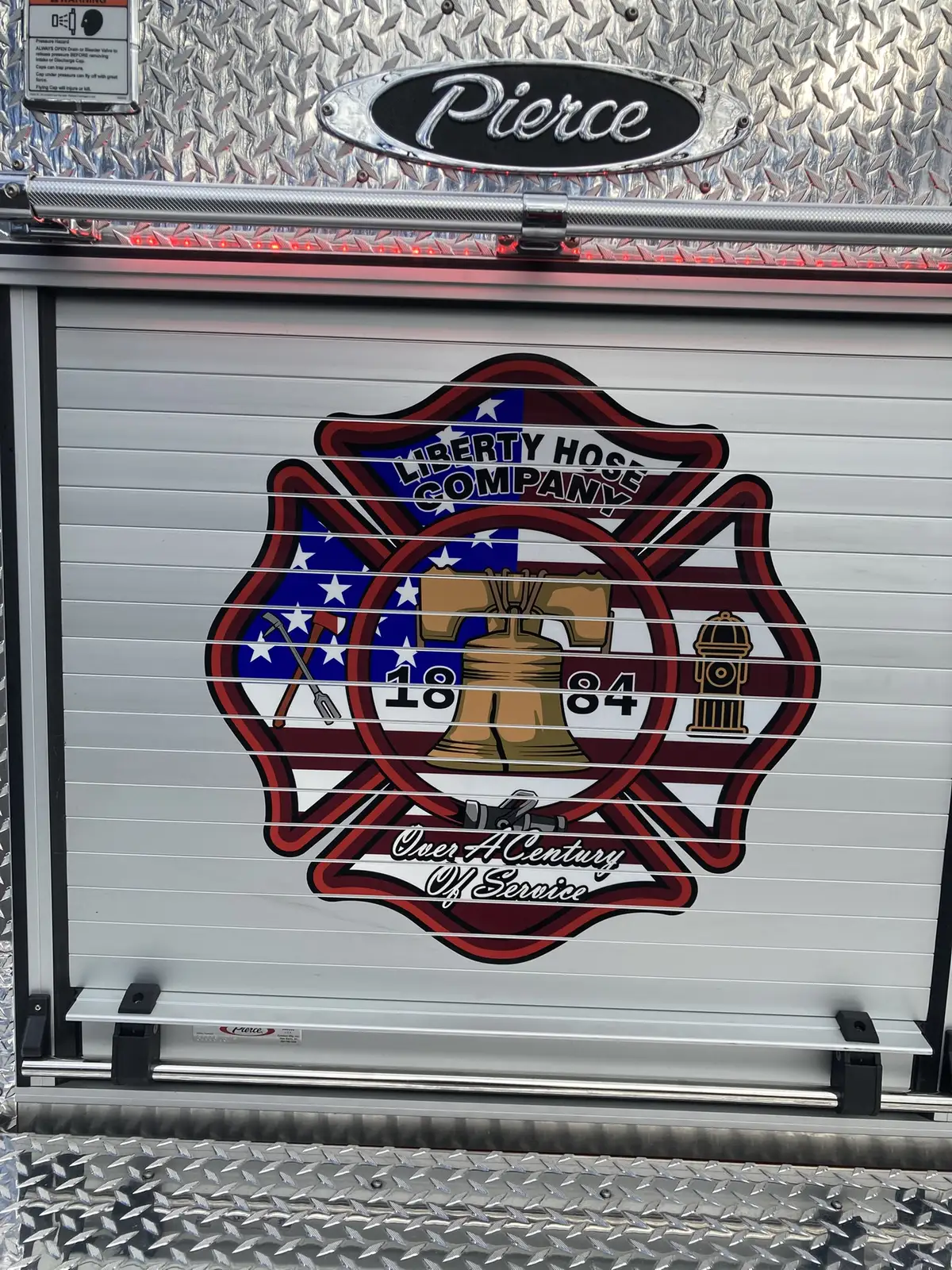 Pump controls detail showing pressure gauges and labeled valve handles