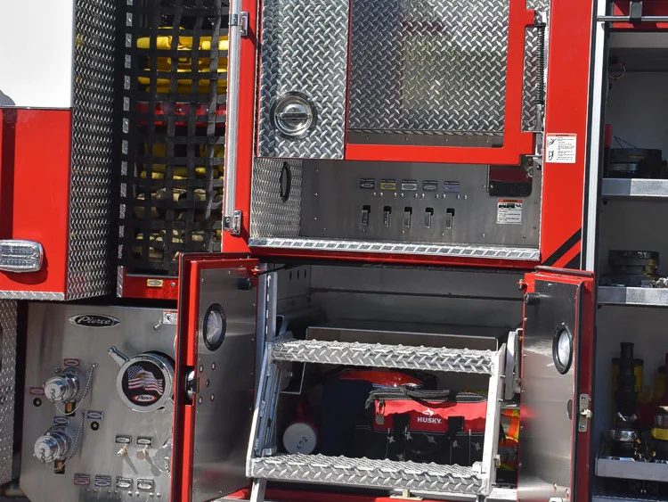 Pump-side panel close-up showing valves, gauges, and control levers