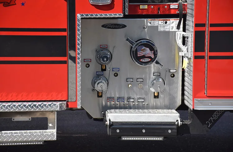 Pump panel close-up showing intake controls and gauge cluster
