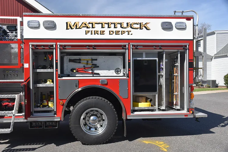 Side profile with compartments open showing shelves and equipment bins