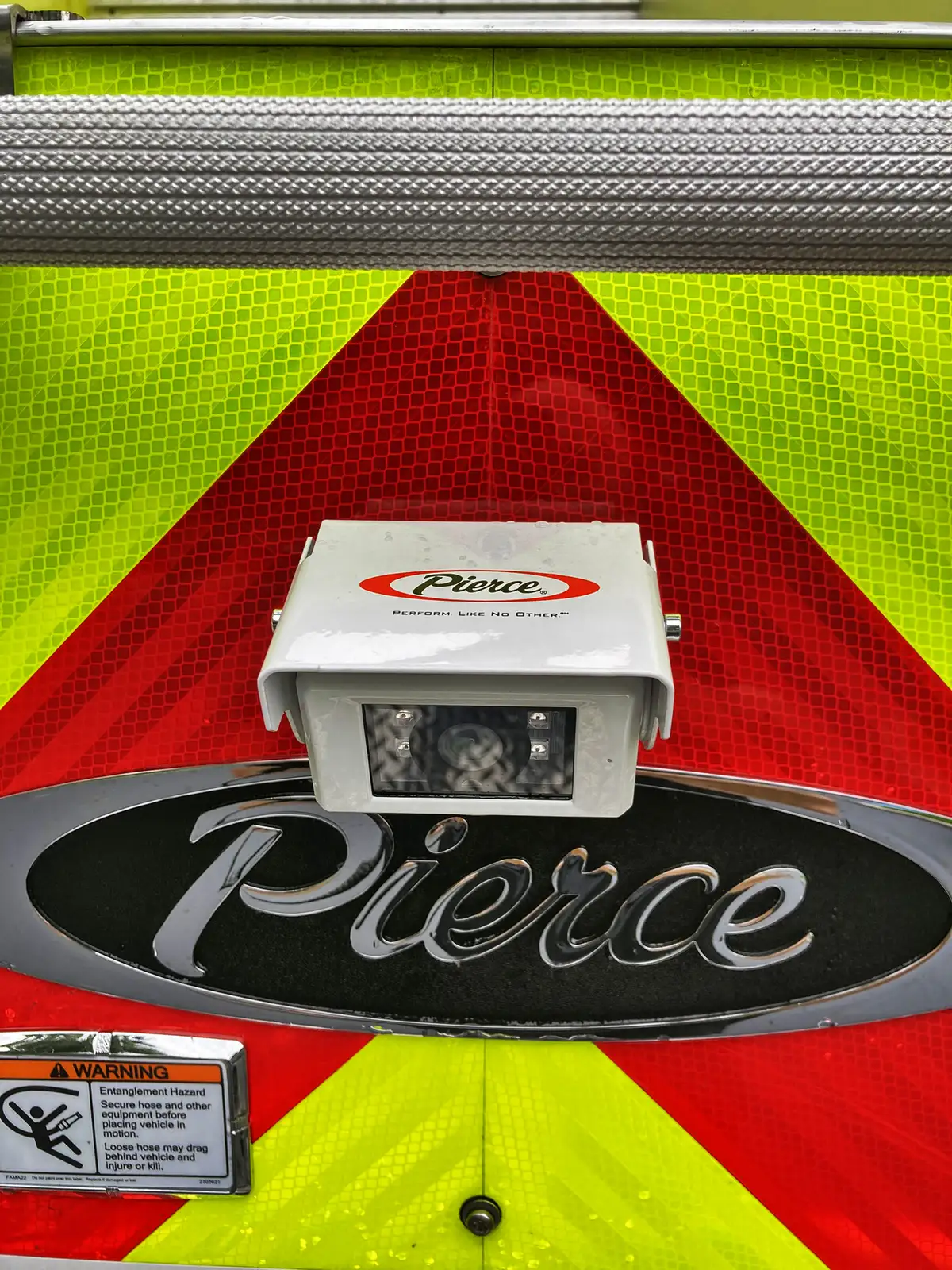 Open side compartment over rear wheel showing shelving and wheel arch