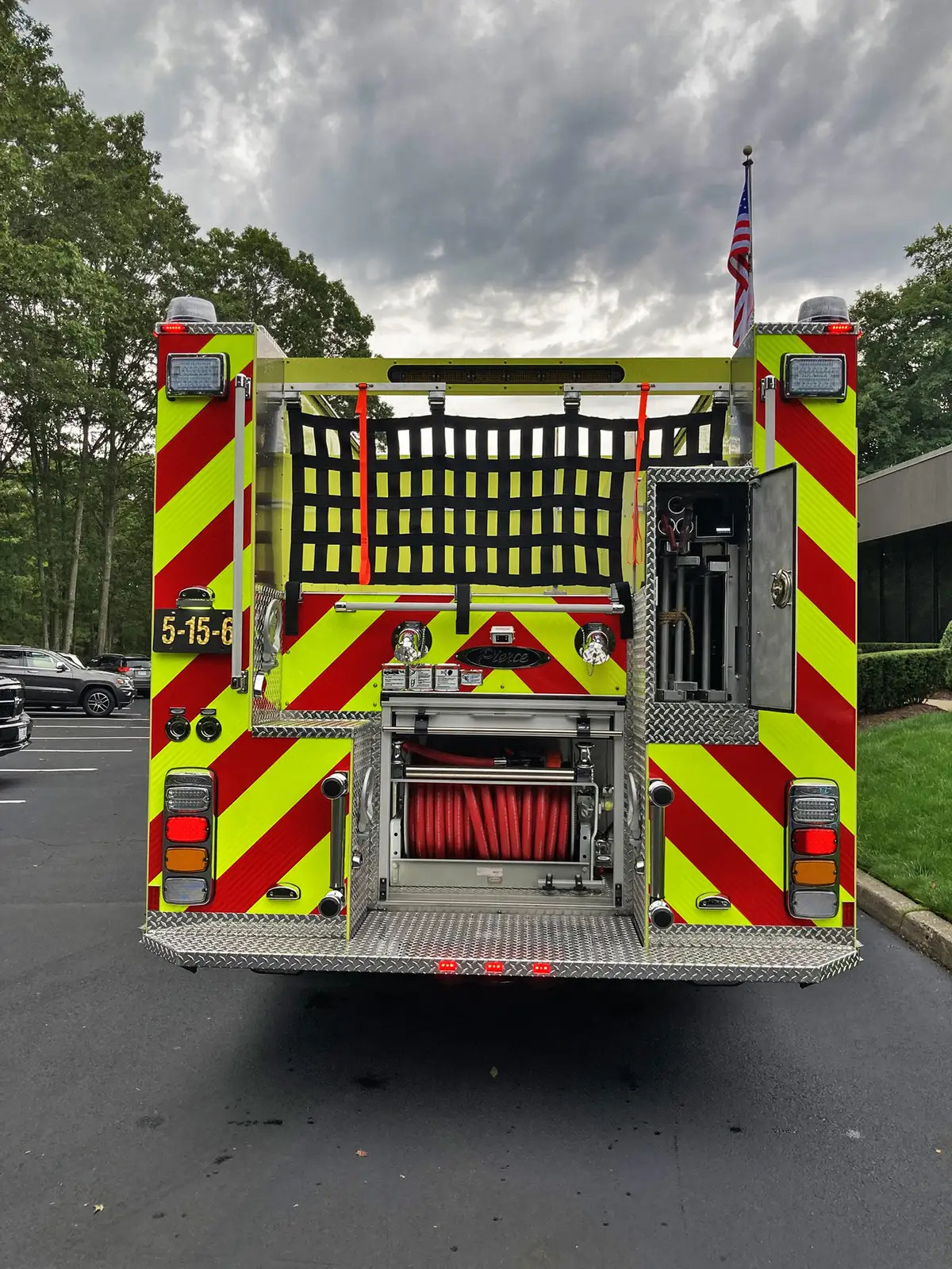 Open compartment with toolboard showing mounted hand tools and fittings