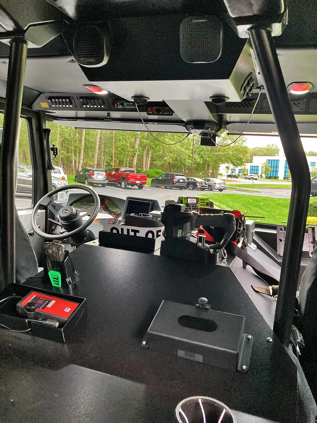 Cab interior wide view showing front seats, console, and dashboard