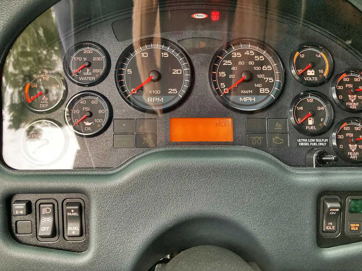 Cab door crest close-up showing logo decal and reflective striping