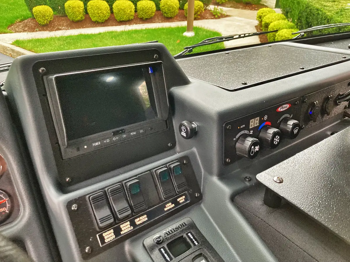 Body logo close-up showing side lettering on compartment door