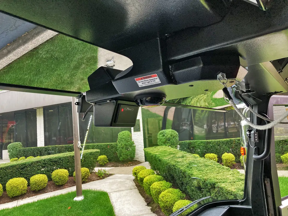 Bumper detail close-up showing warning light housing and intake hardware