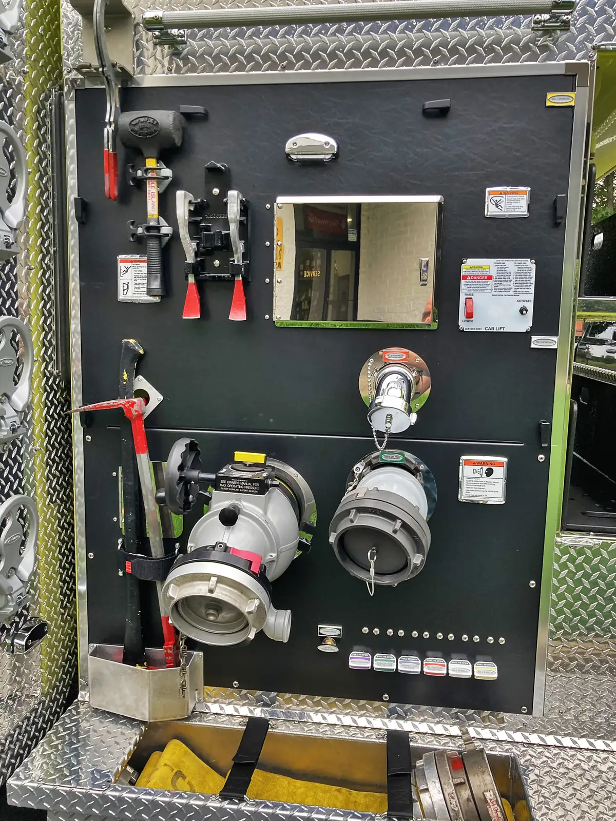 Front-right exterior close view showing grille, bumper, and cab corner