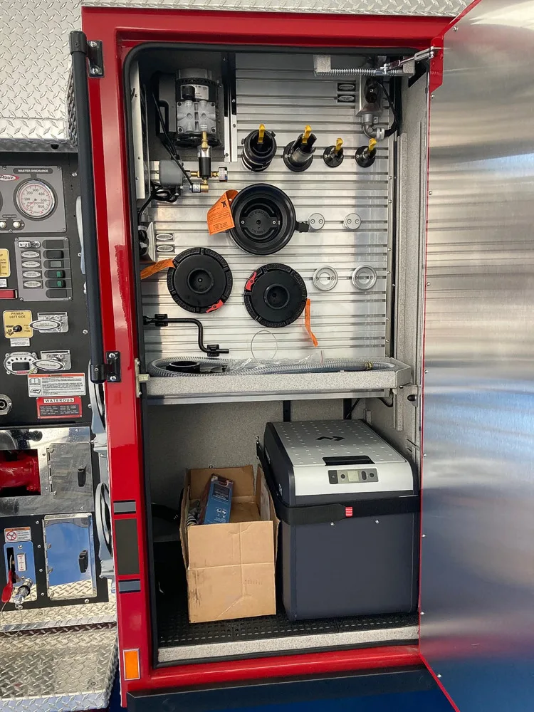 Pump-side intake panel close-up showing large intake ports and fittings