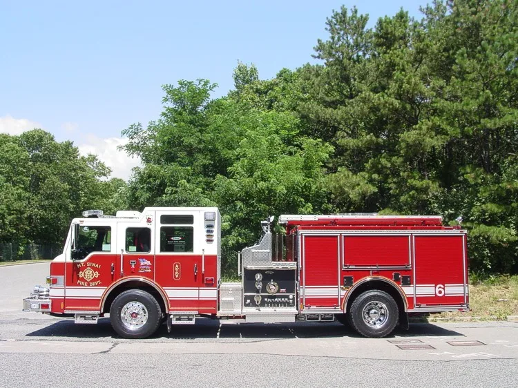 Driver-side profile view showing side compartments and pump panel area
