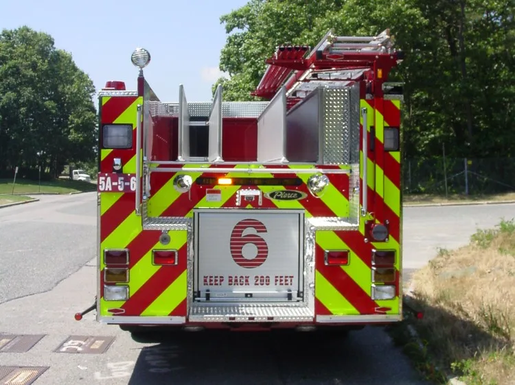 Rear view showing chevron striping and rear panel fittings