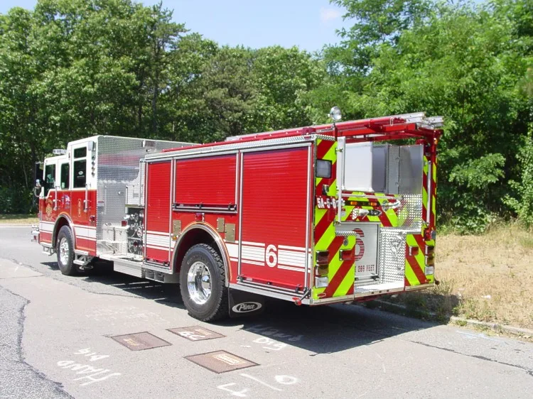Rear-right exterior view showing side body and rear chevrons