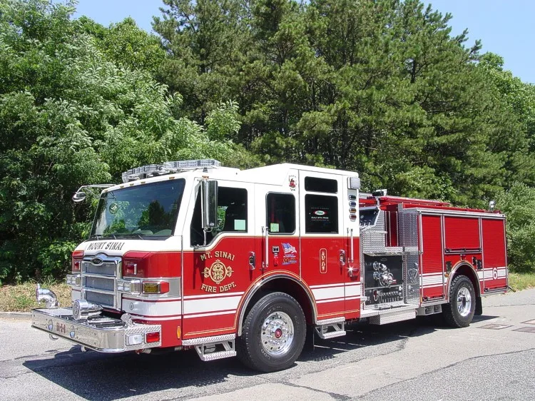 Front-right exterior view showing enclosed cab and side compartments