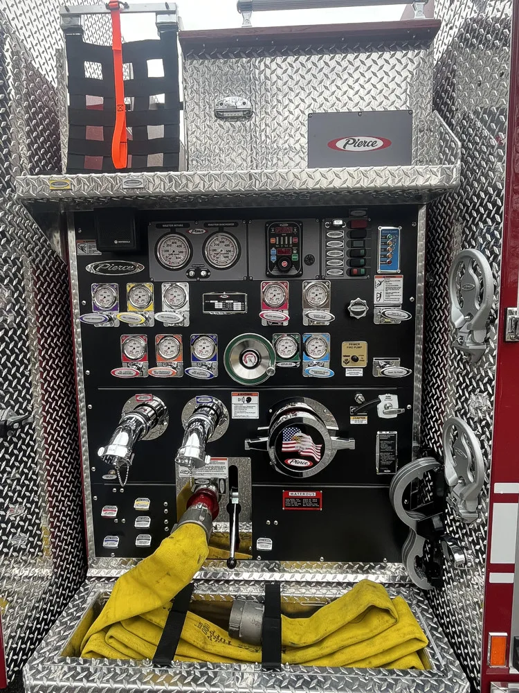 Pump panel close-up showing gauges, intake ports, and control labels