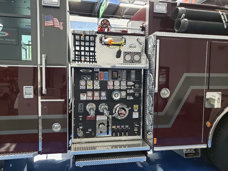 Pump panel close-up showing gauges, valves, and intake controls