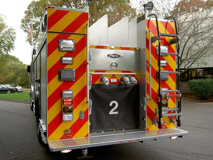 Rear view showing chevron striping and rear body panel