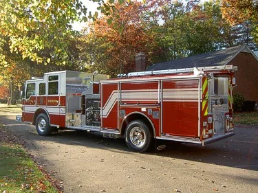 Rear-right exterior view showing side compartments and rear body panel