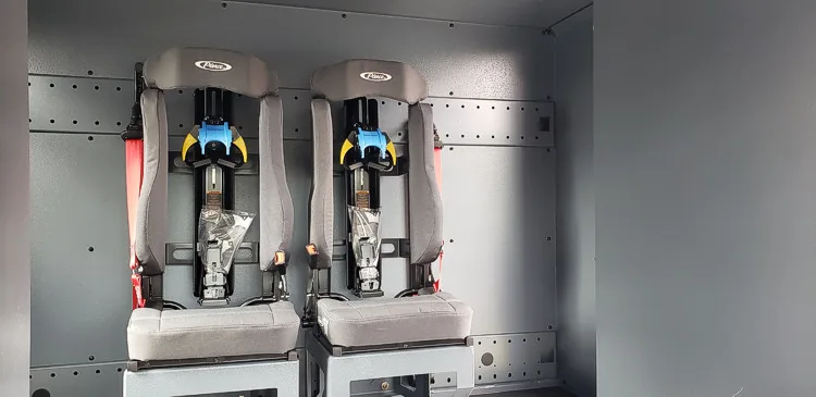 Open compartment close-up showing mounted nozzles and intake fittings