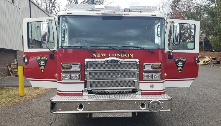 Head-on front view showing grille and bumper intake from low angle