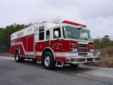 Front-right exterior view showing cab and side body compartments