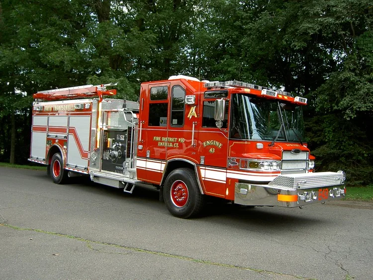Front-left exterior view showing enclosed cab and side body