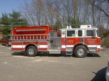 Driver-side full profile showing side body and wheel area