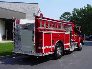 Rear-right exterior view showing rear body panel and side compartments