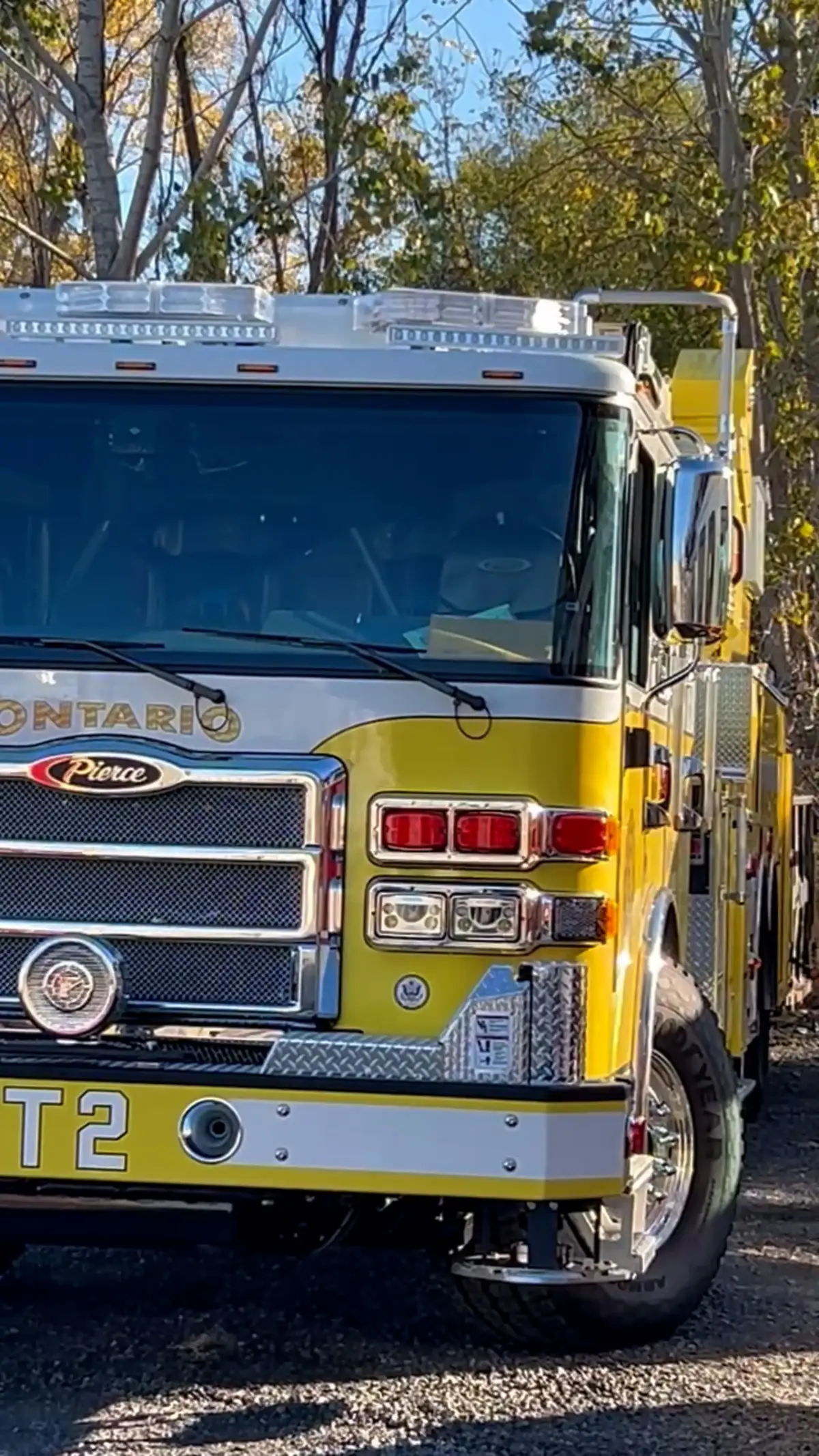Front-right exterior view showing grille, bumper, and cab corner