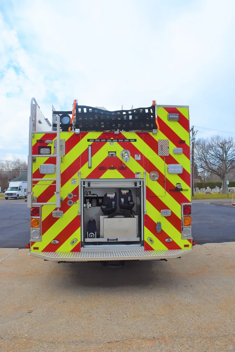 Rear view showing chevrons, rear opening, and tailboard area