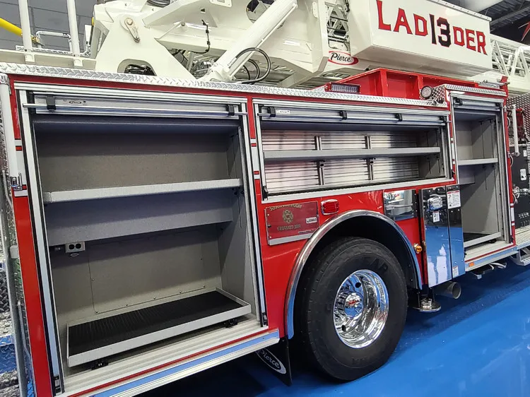 Open side compartment showing long storage bay and shelf space