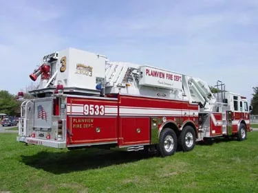 Rear-left exterior view showing tower bucket and side body compartments