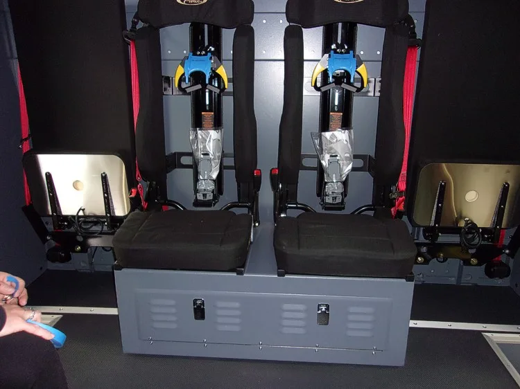 Rear crew interior view showing SCBA seats and storage box mounts