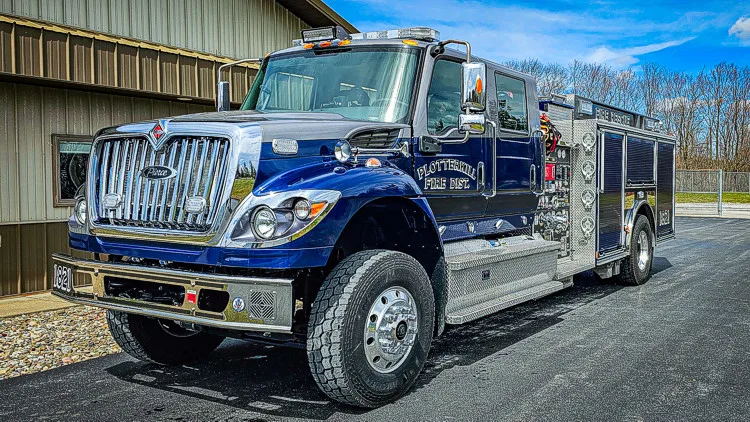 Front-left exterior profile showing cab and side body